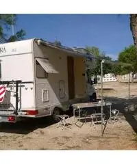 Camper mansardato con portamoto portatutto Camper mansardato con portamoto portatutto